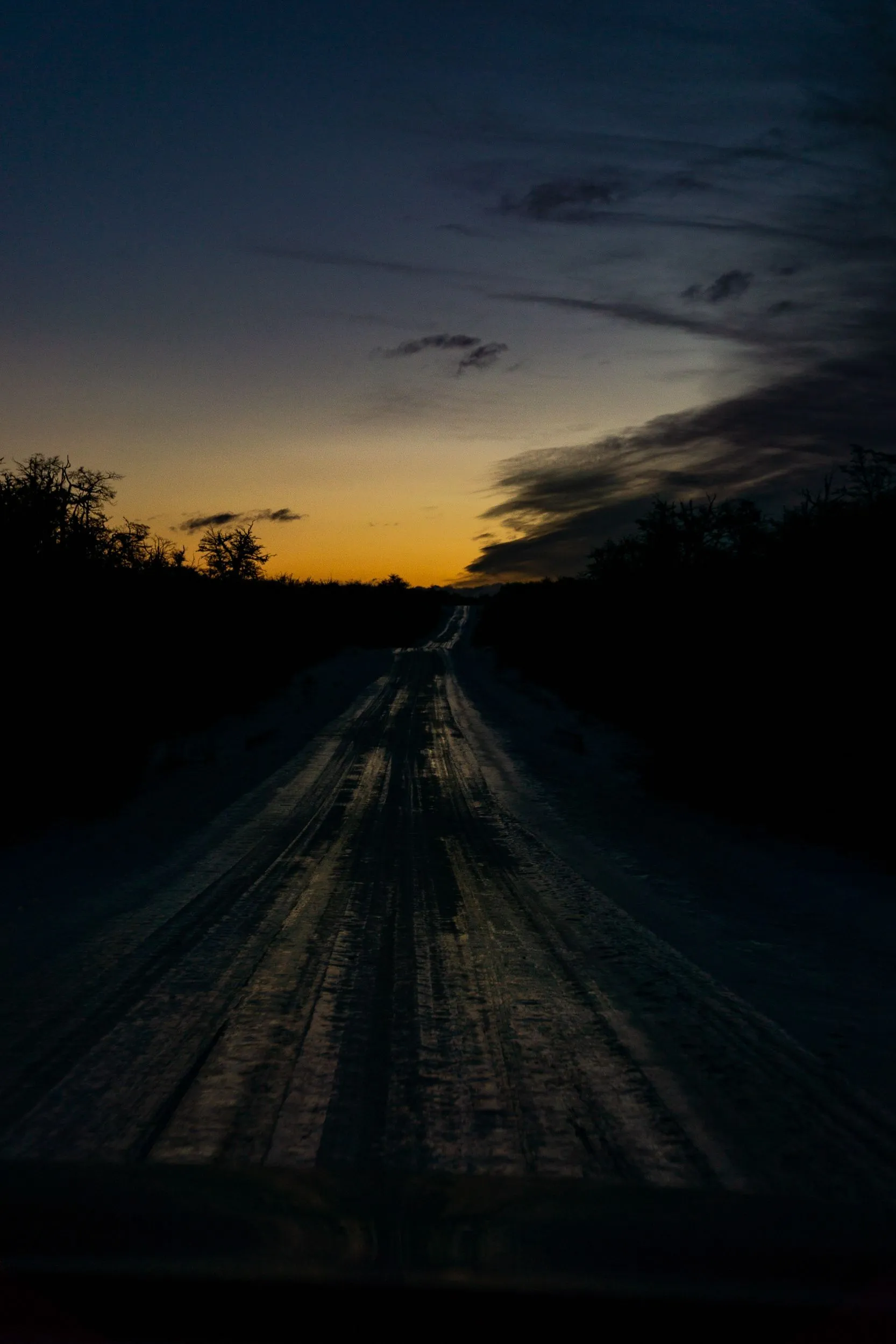 Warm sunset light along a quiet road near Tolhuin.