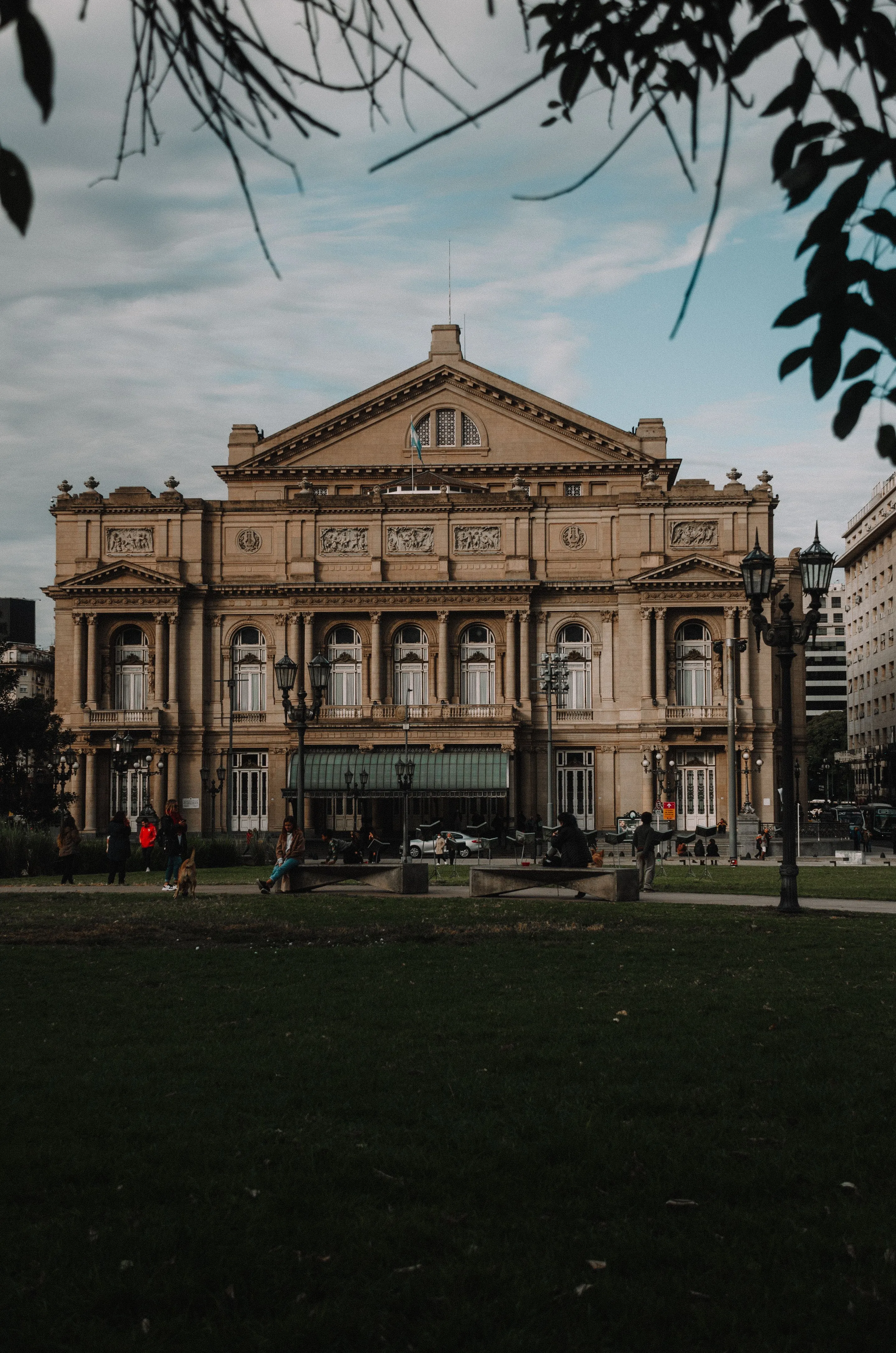 The ornate exterior of Teatro Colón in the evening.