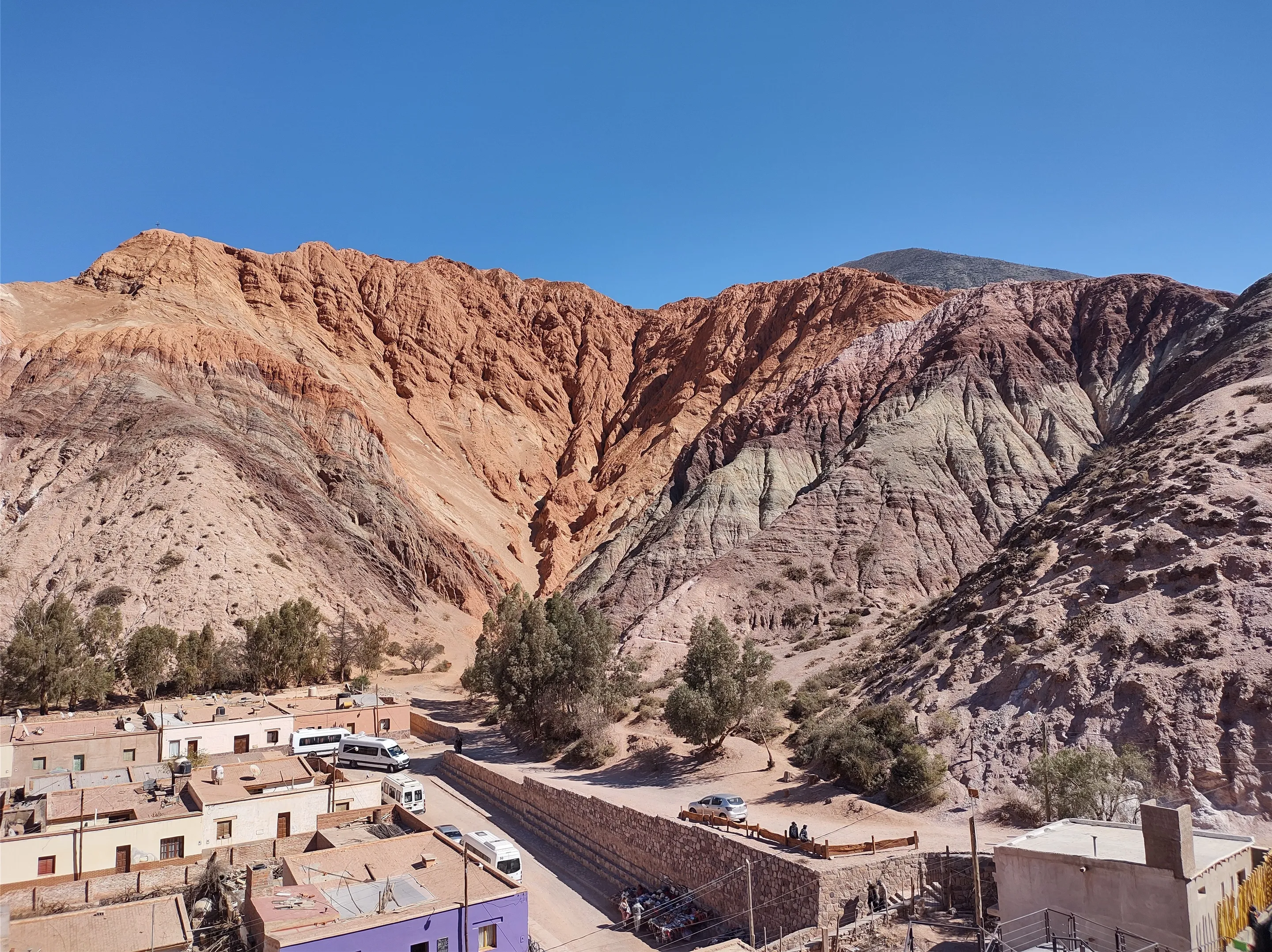 Purmamarca beneath the layered Hill of Seven Colours