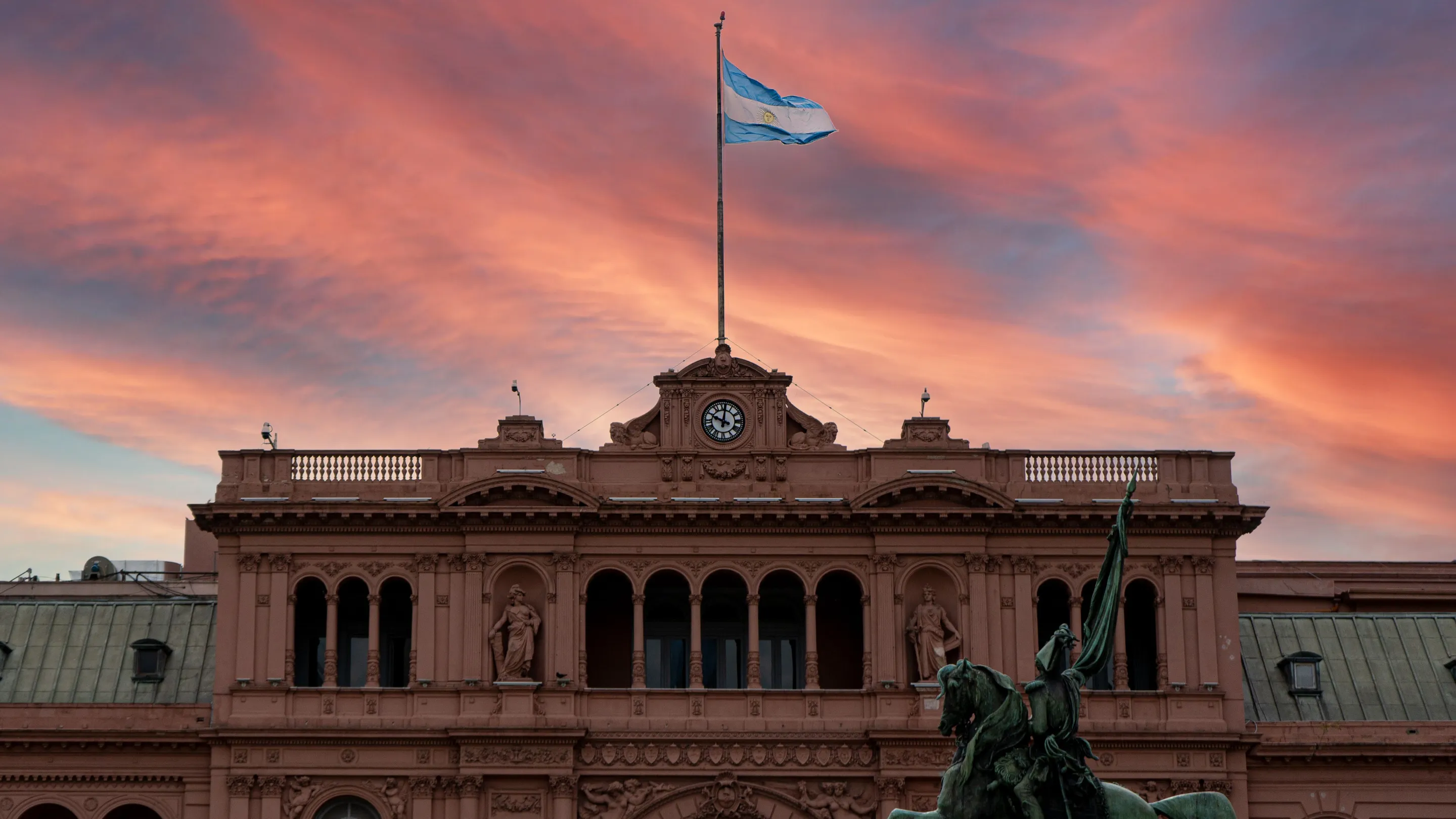 The Argentine flag and Casa Rosada in the evening light, Buenos Aires.