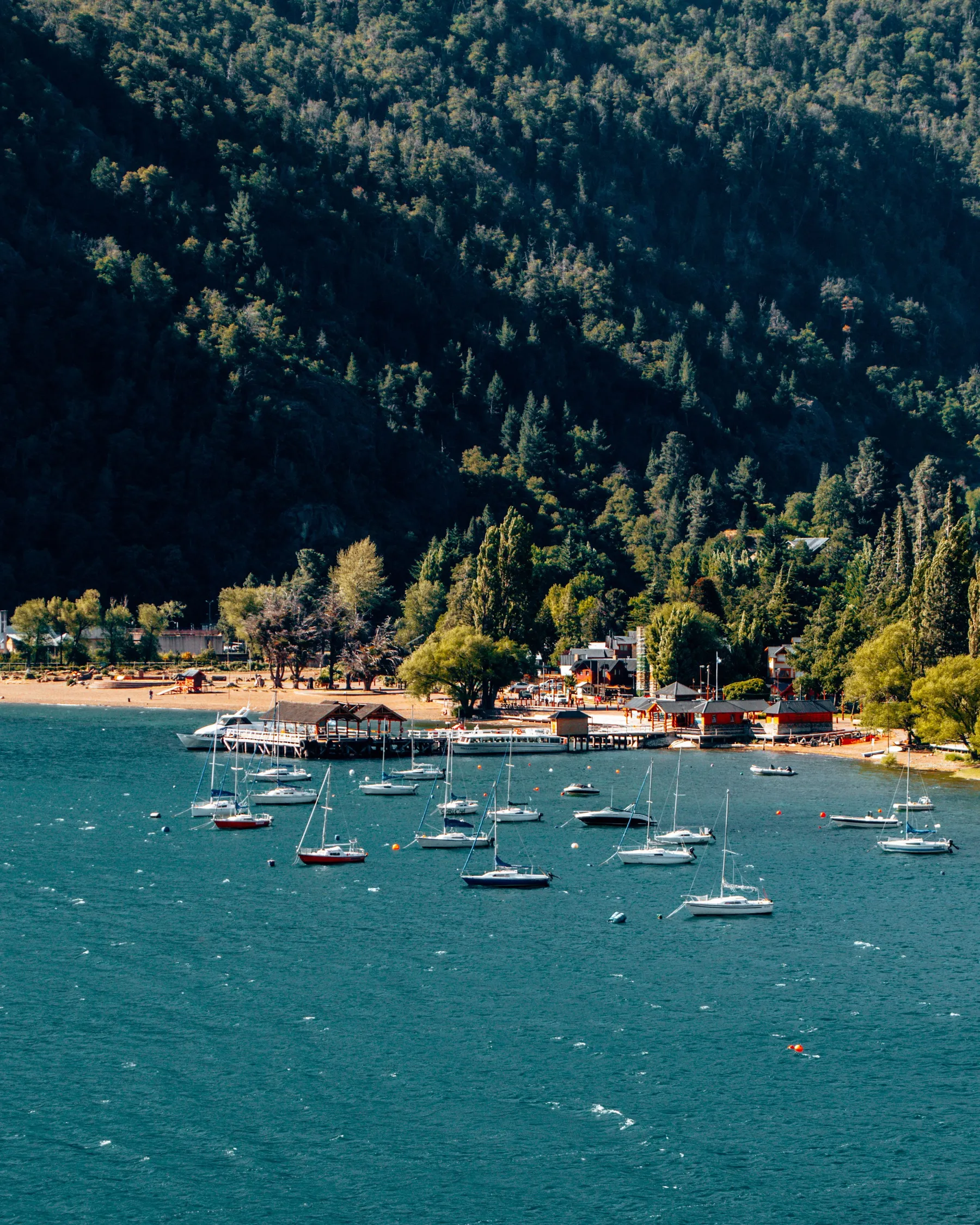 Sailboats and the wooded shore at San Martín de los Andes