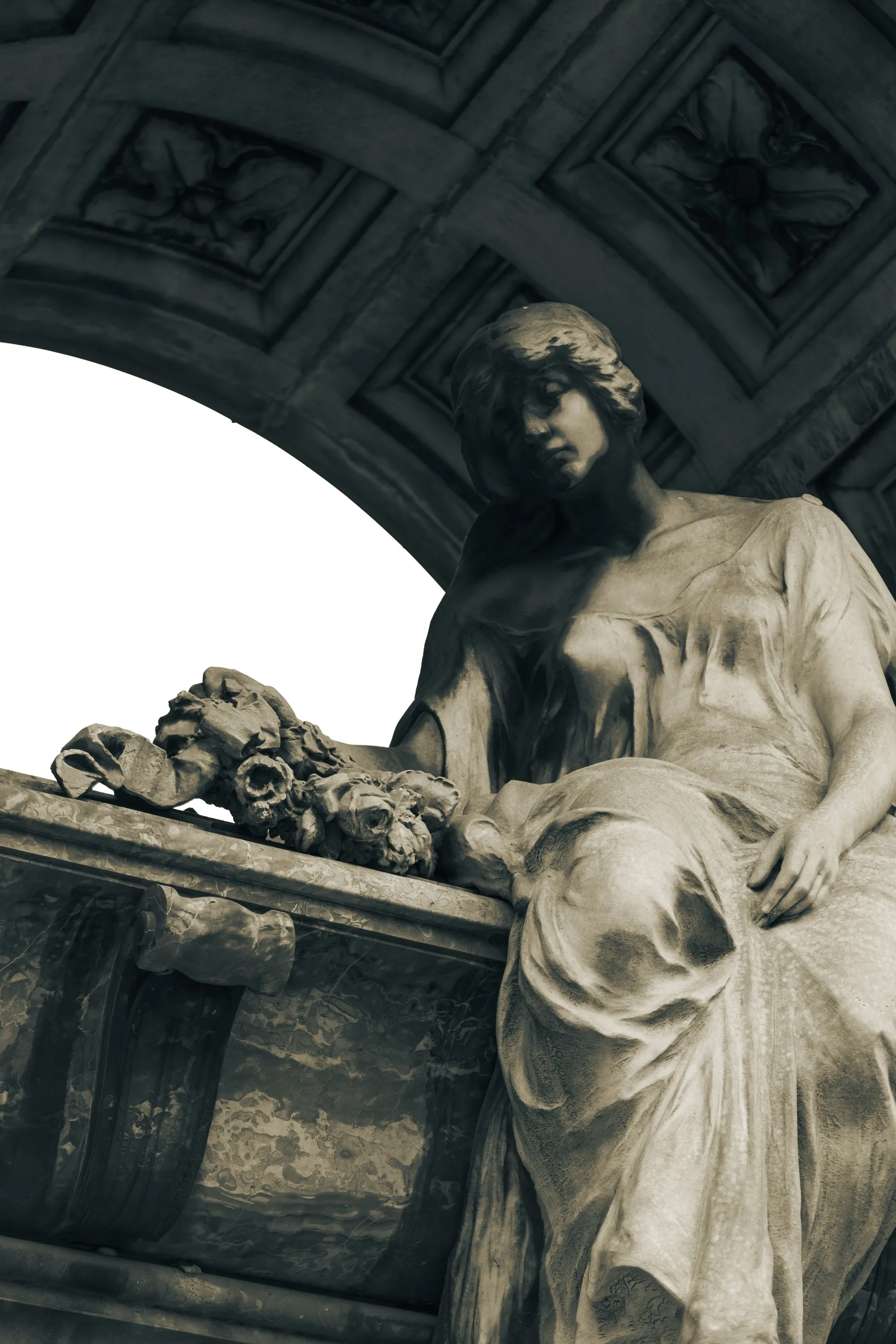 The sculptural detail of a figure in Recoleta Cemetery.