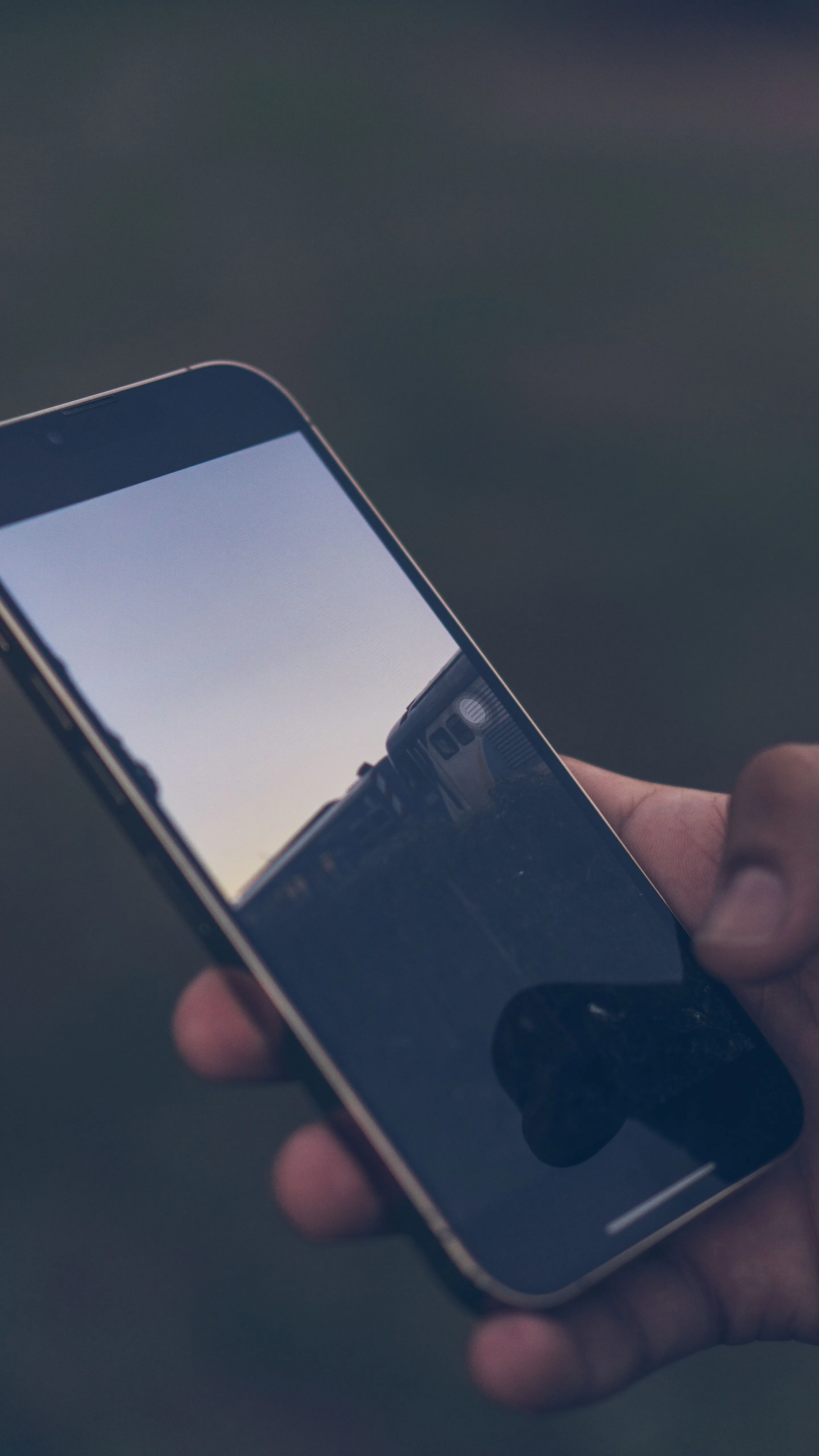 A phone reflecting the evening light in Buenos Aires.
