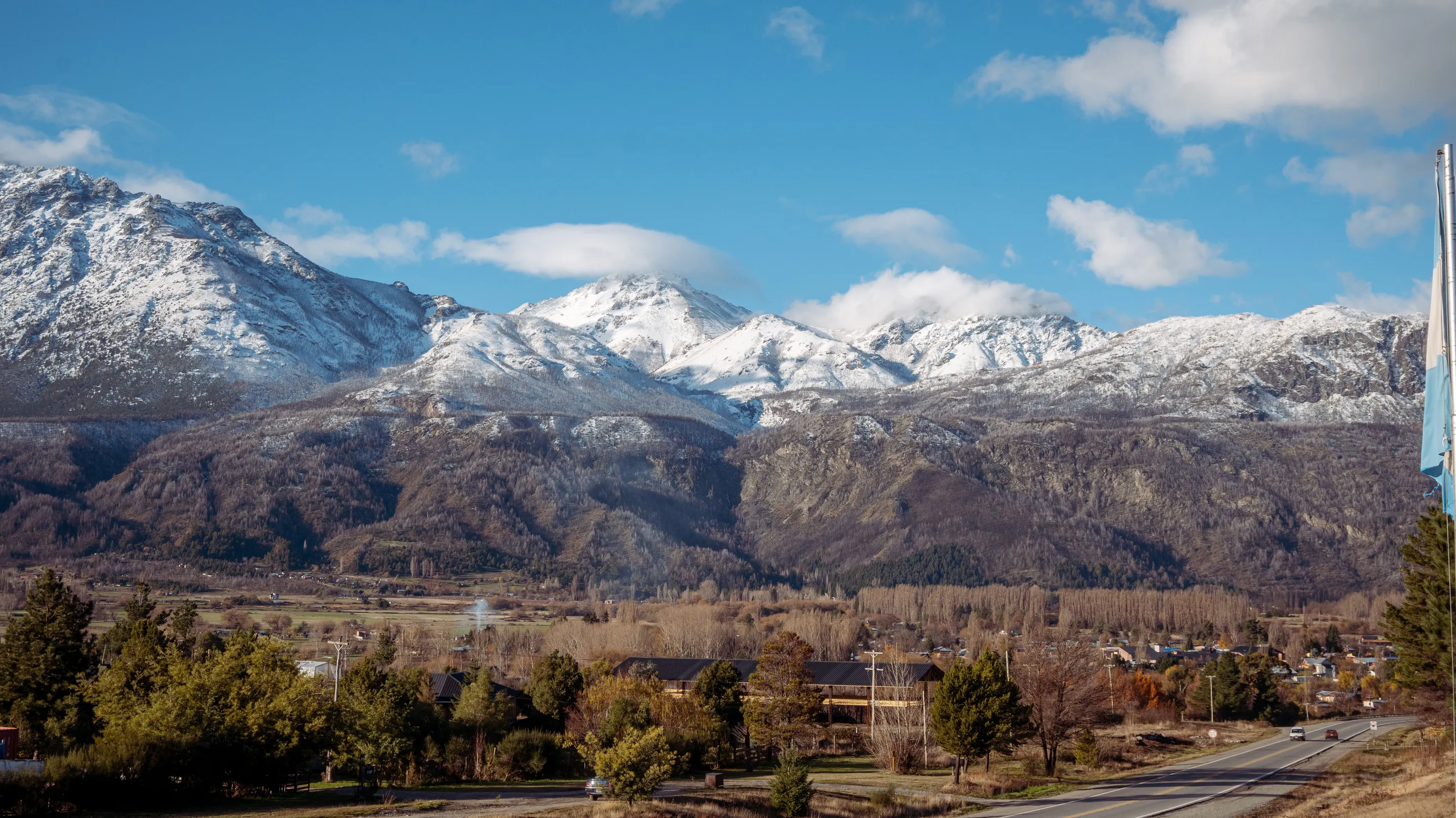 El Bolsón spread across a valley beneath snow-covered mountains