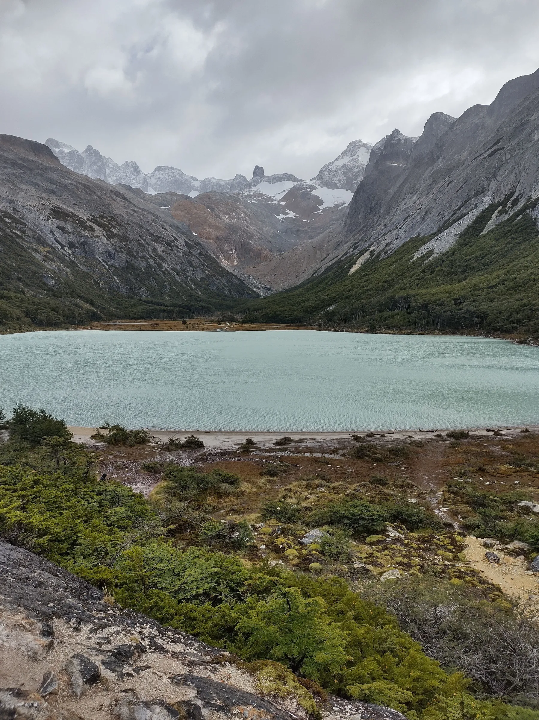A lake beneath mountains near Ushuaia.
