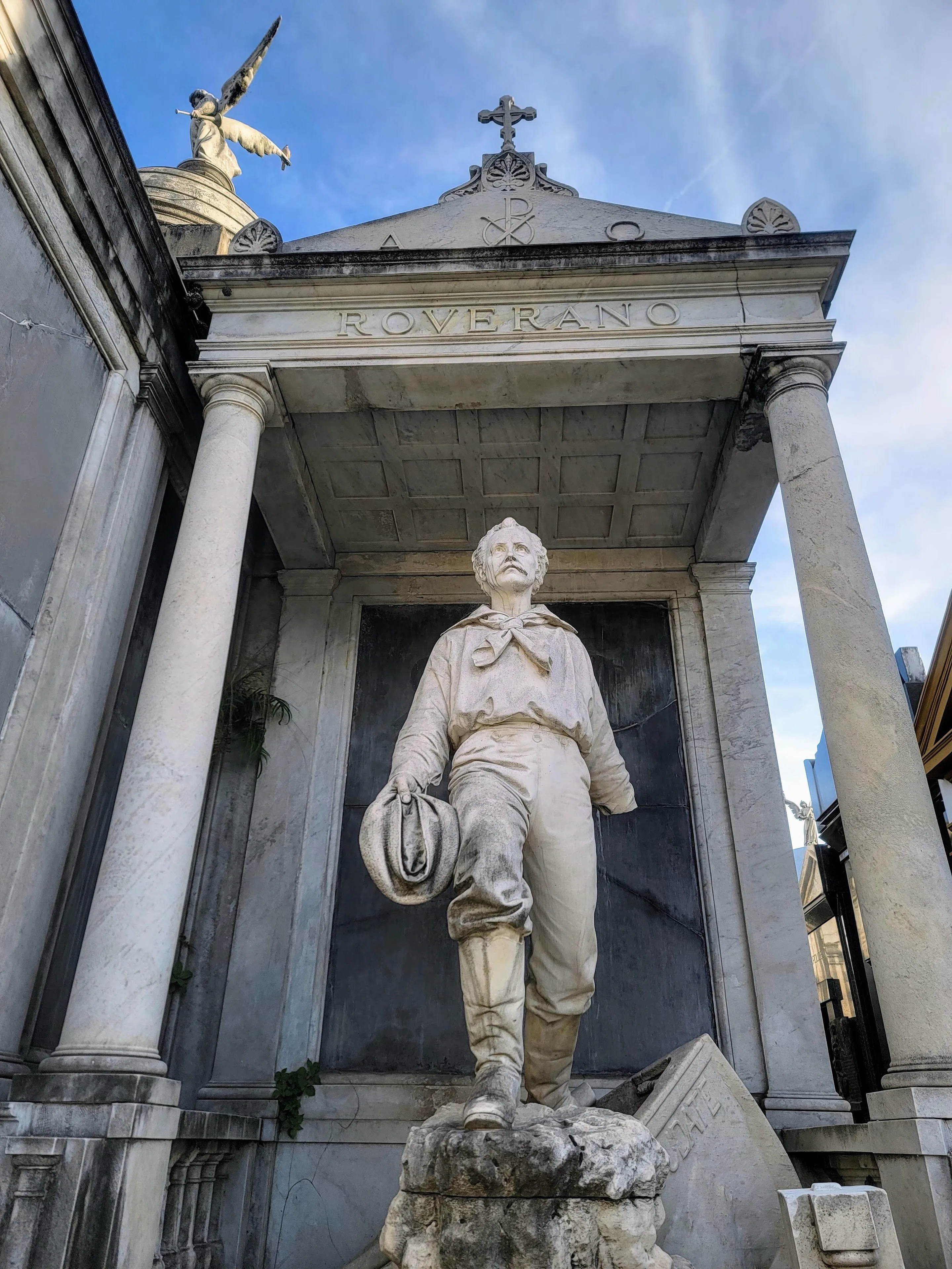 Stone figure and columns of the Roverano mausoleum in Recoleta Cemetery