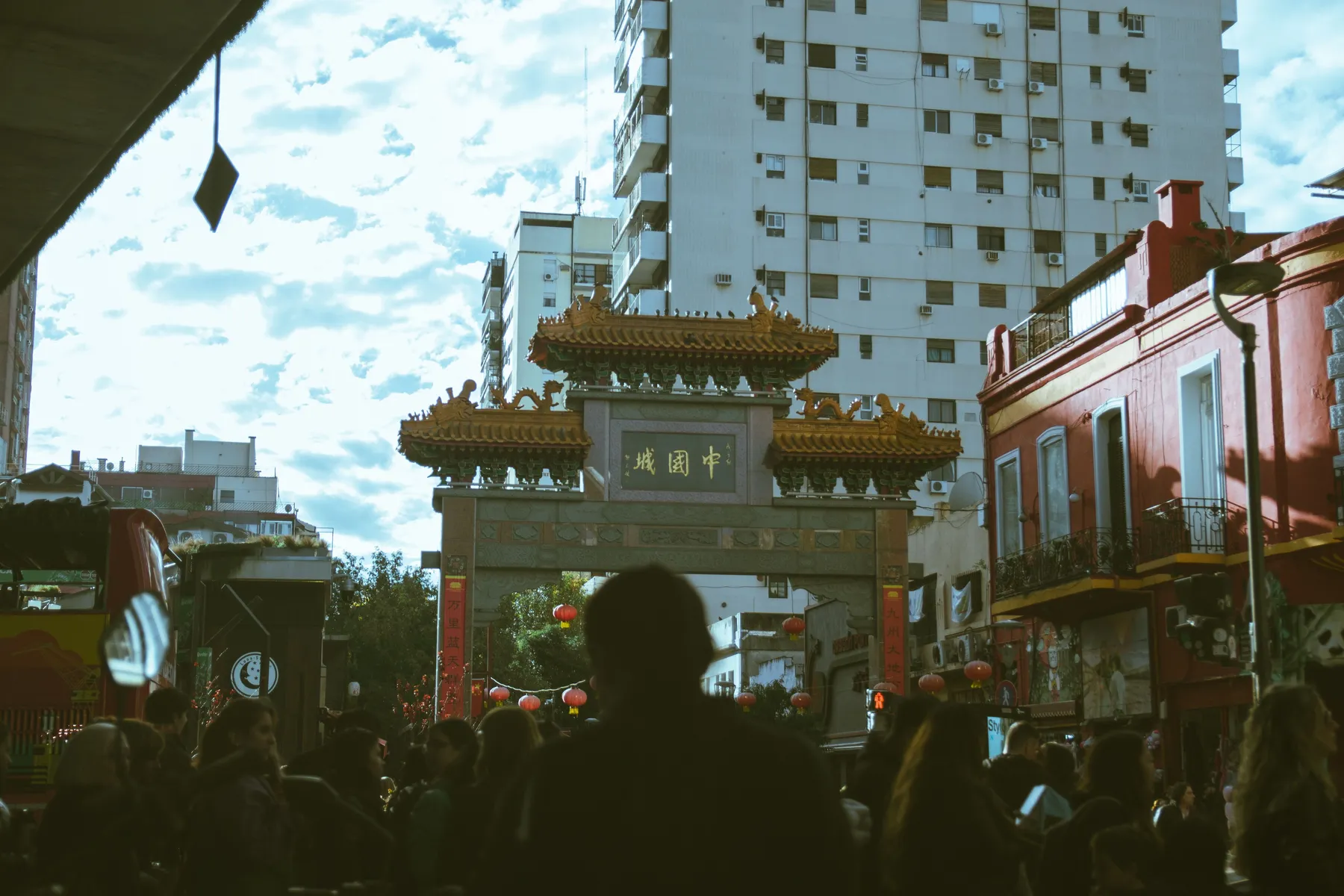 Visitors beneath the ornate Arco Chino in Belgrano