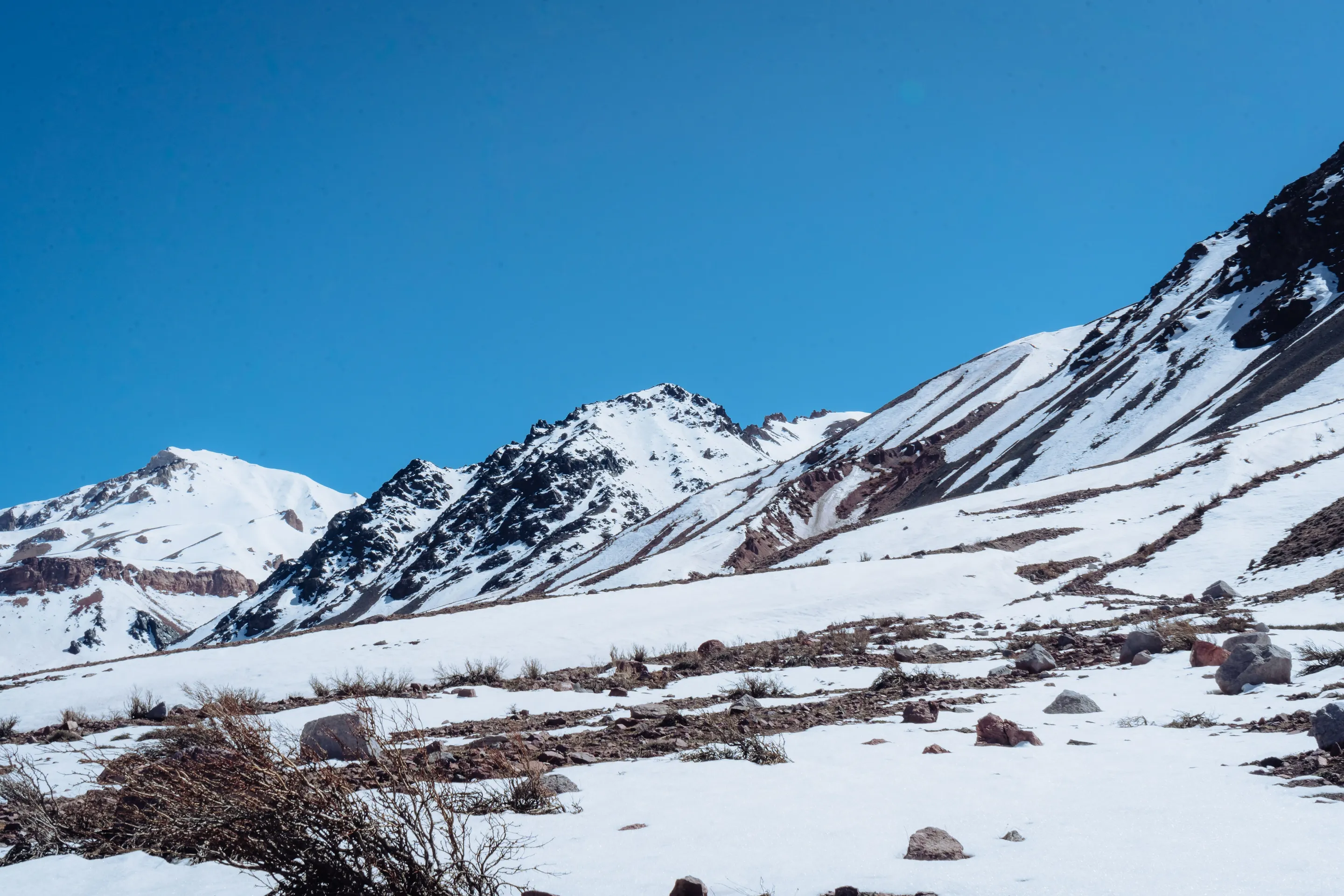 Snow spread across the mountain landscape at Los Penitentes.
