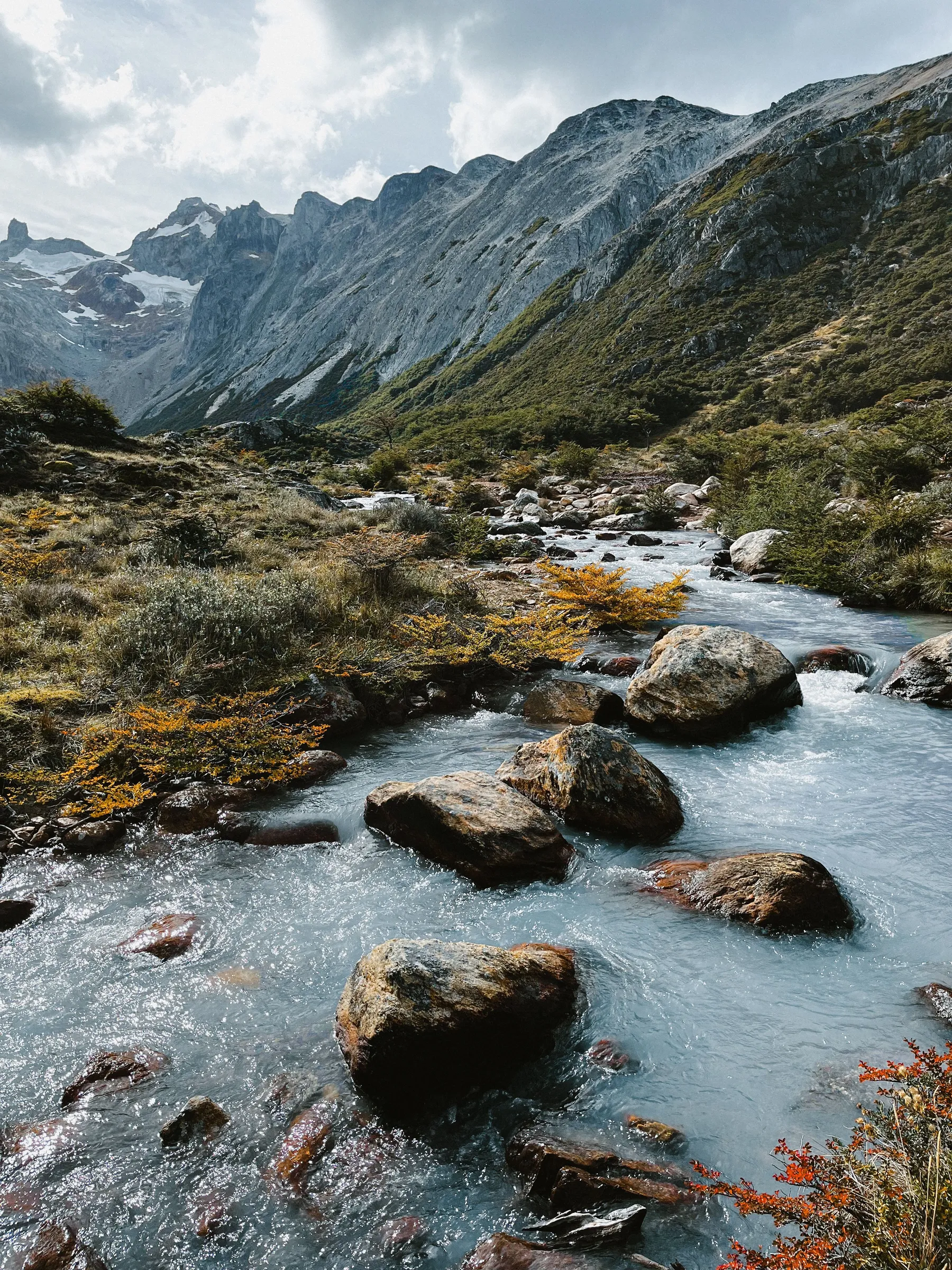 A river and mountain landscape on the Laguna Esmeralda route near Ushuaia