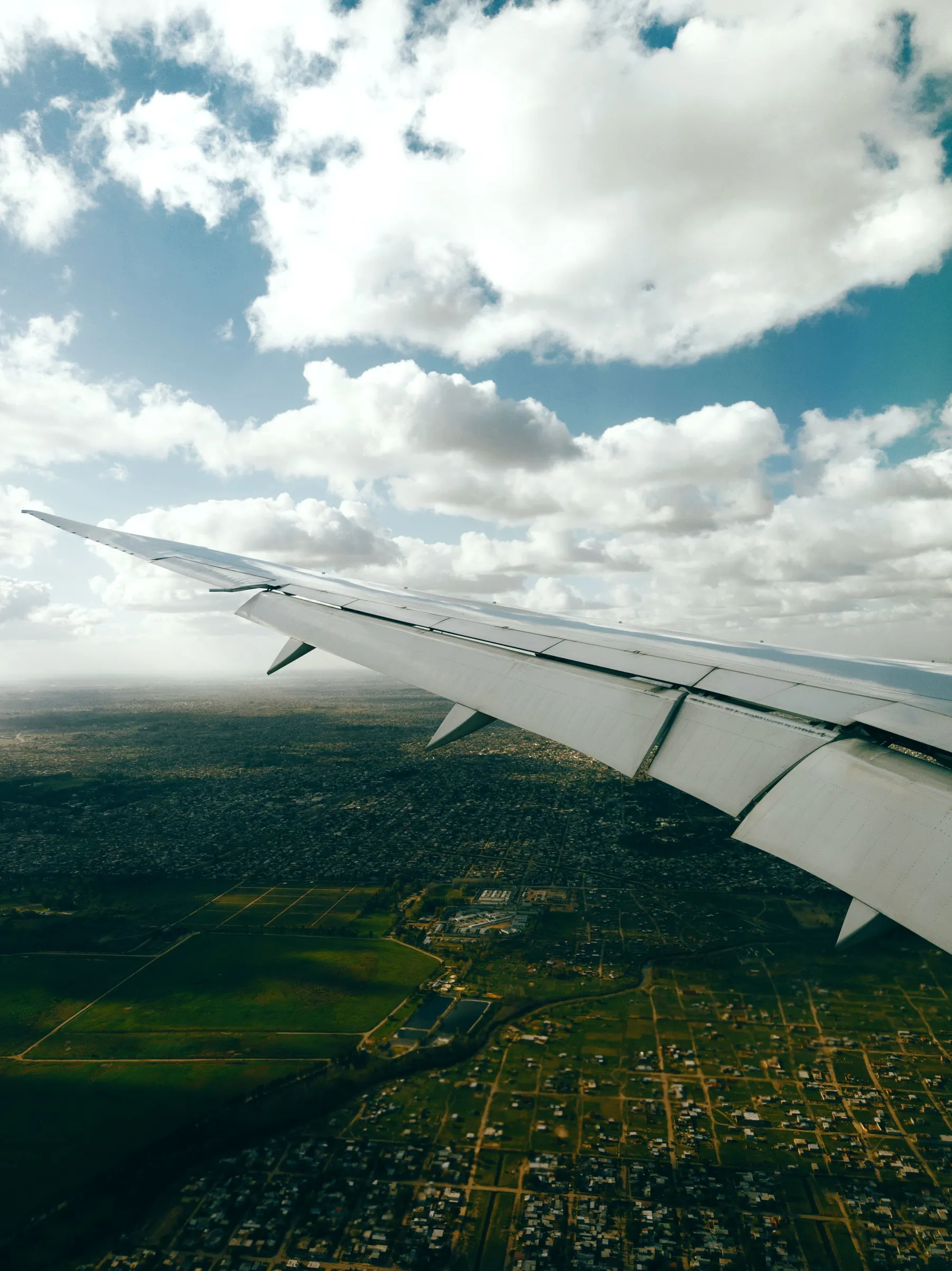 An aerial view across Buenos Aires from an aircraft window.