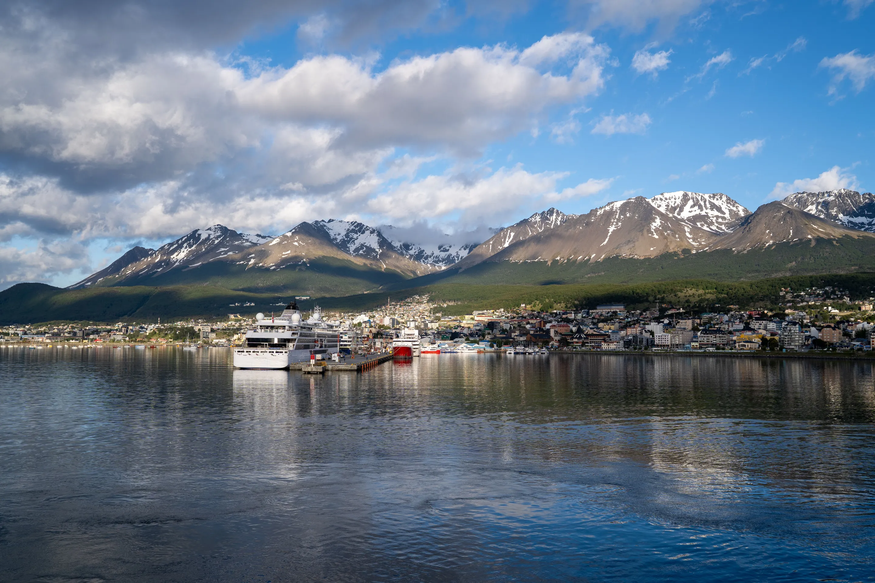 Ushuaia's harbour with the Andes behind it.