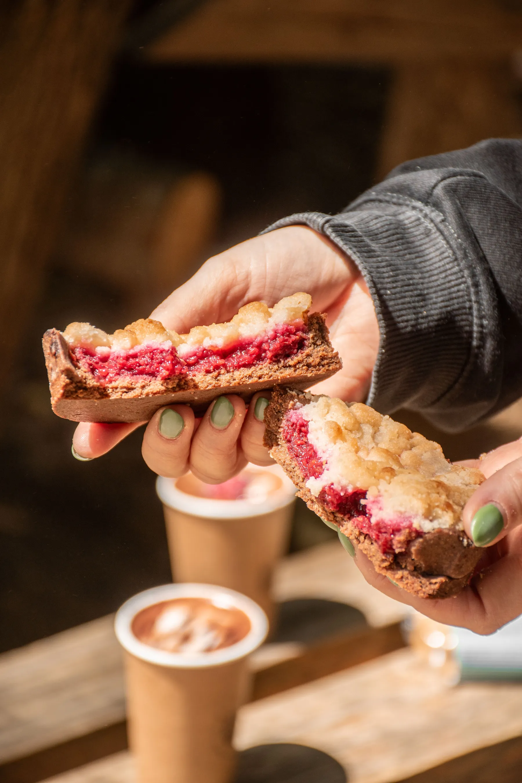 Close-up of a berry tart with hot chocolate in the Patagonian outdoors