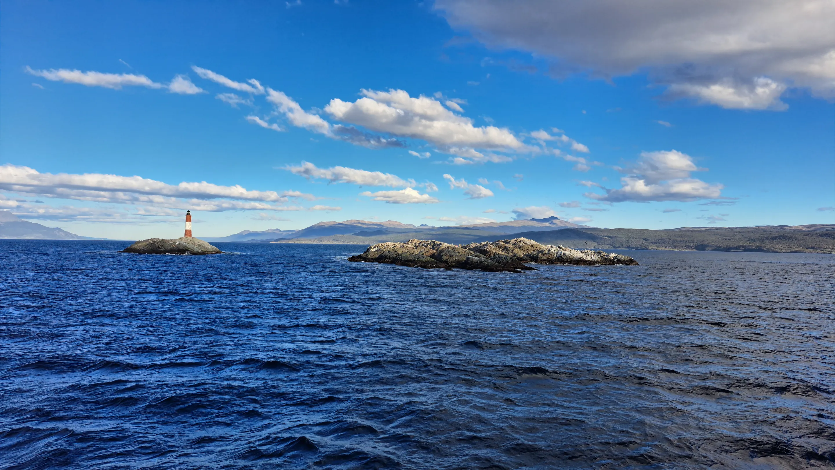 Les Eclaireurs Lighthouse beneath clouds on the Beagle Channel