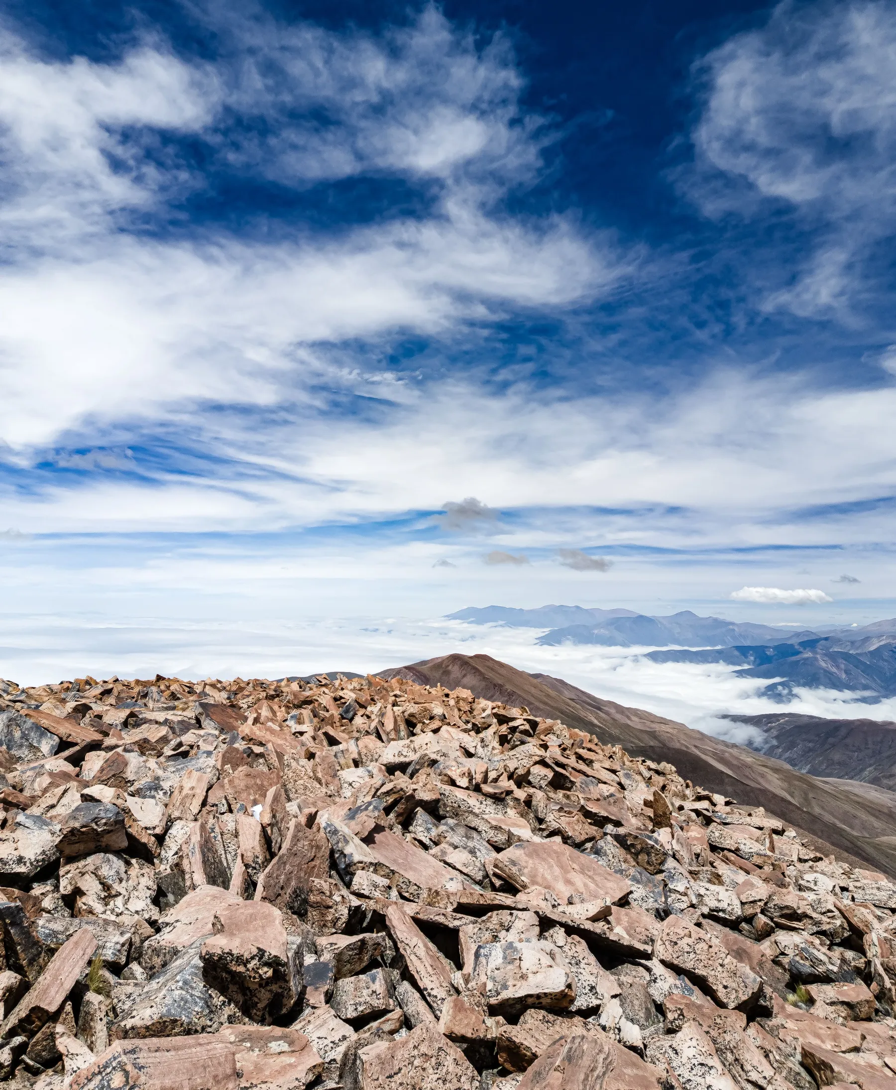 Rocky highland terrain under cloud in Jujuy Province.