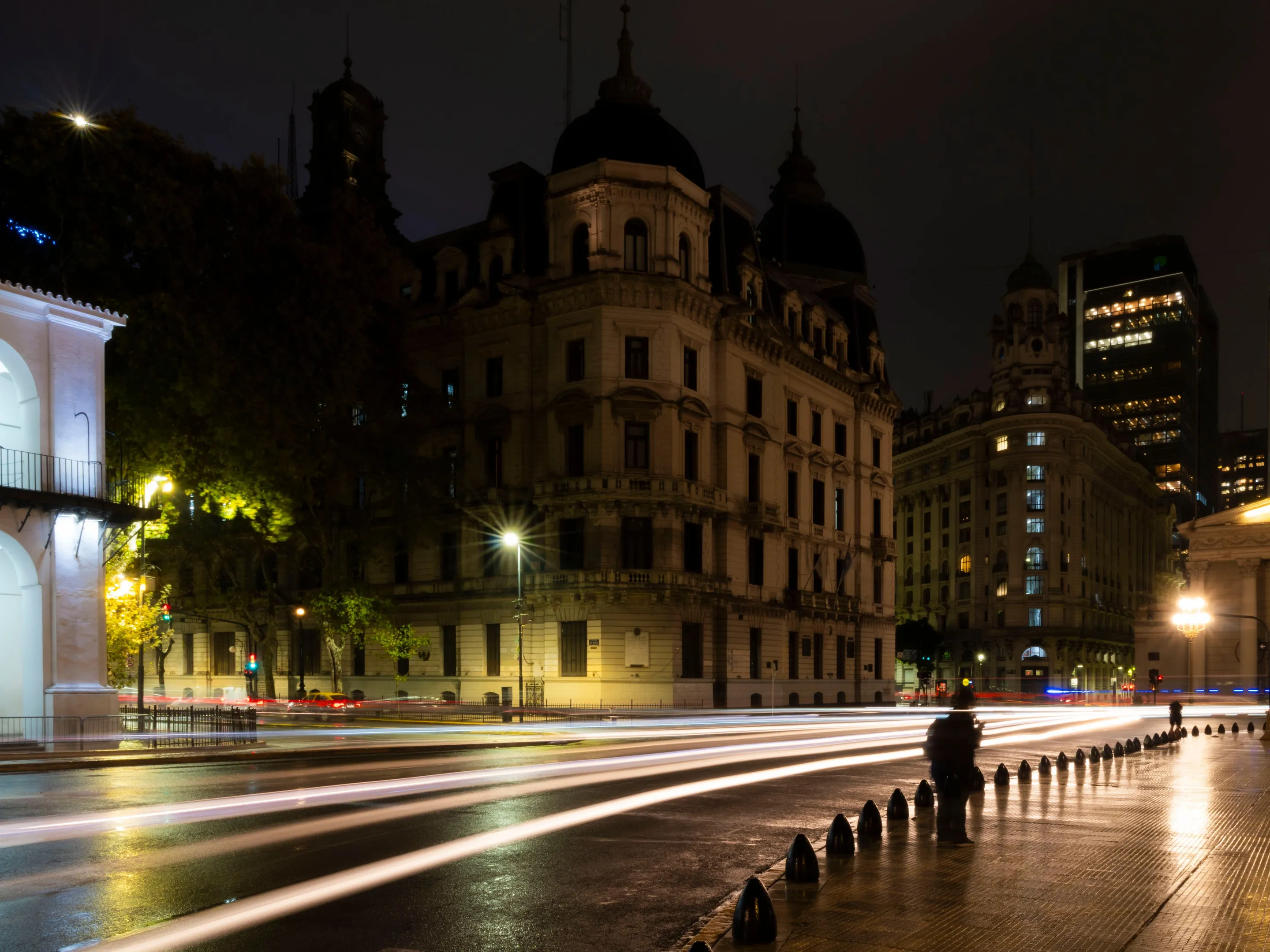 Historic Buenos Aires façades and light trails after dark