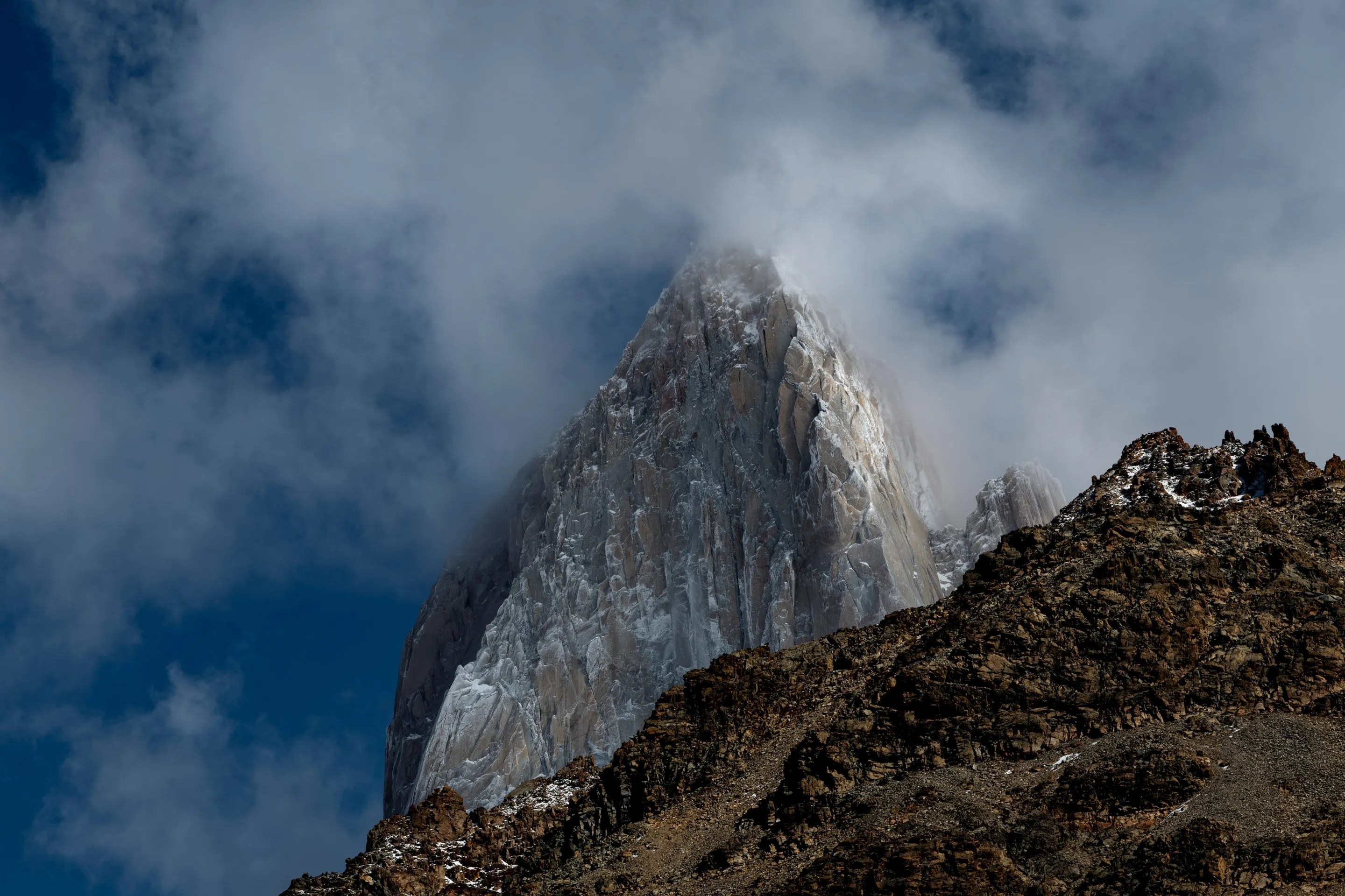 Mount Fitz Roy rising through cloud near El Chaltén.