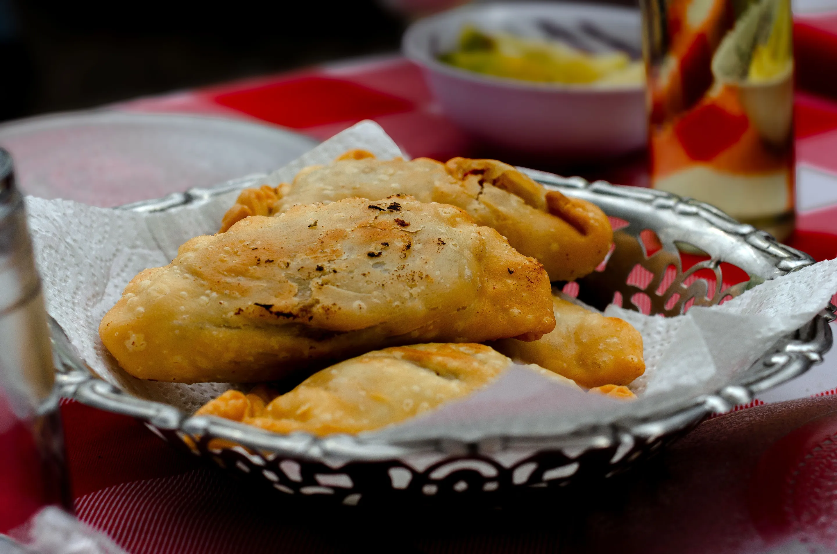 Empanadas served on a decorative plate in Buenos Aires.