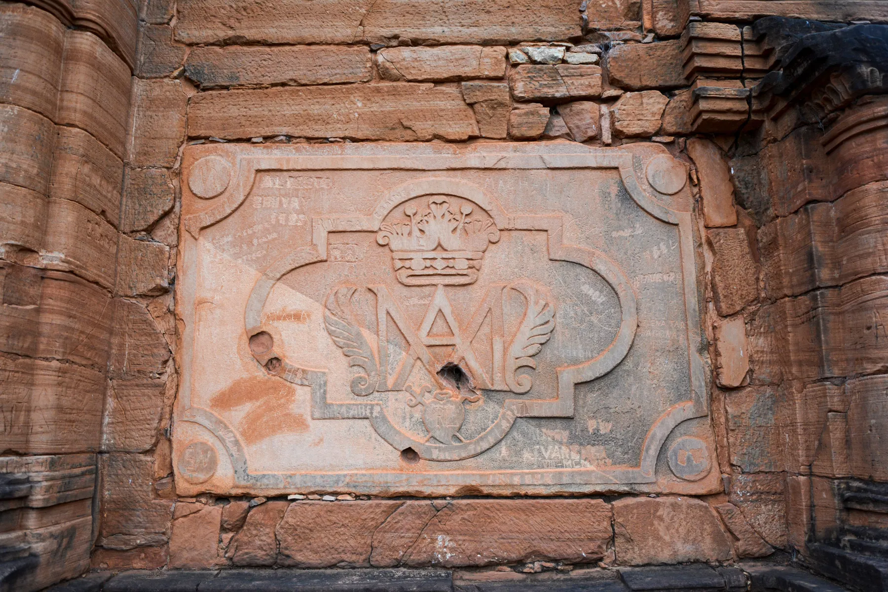 Weathered carved stone at the Jesuit mission ruins in San Ignacio