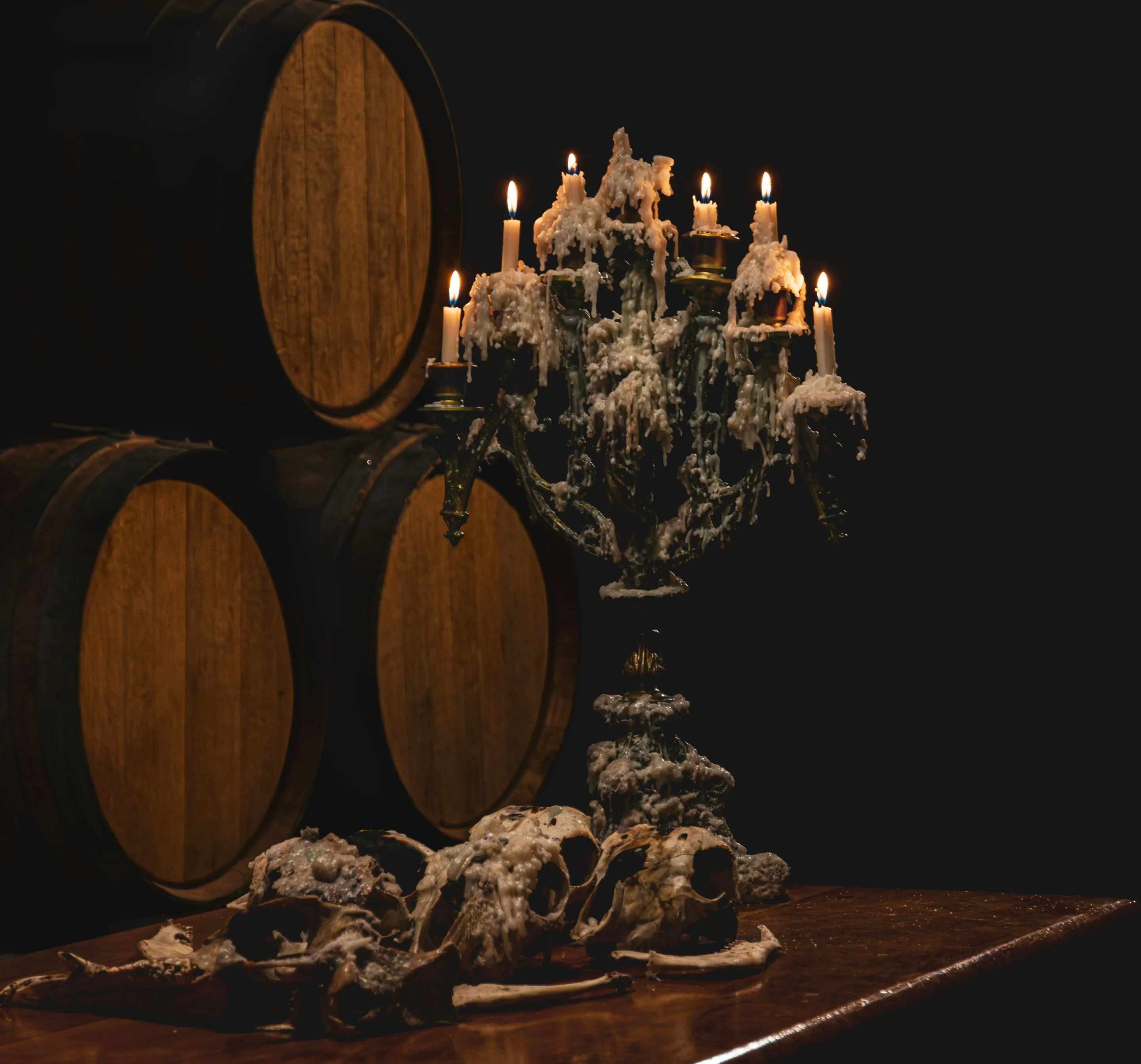 Candlelight and sculptural details inside Casa Vigil winery