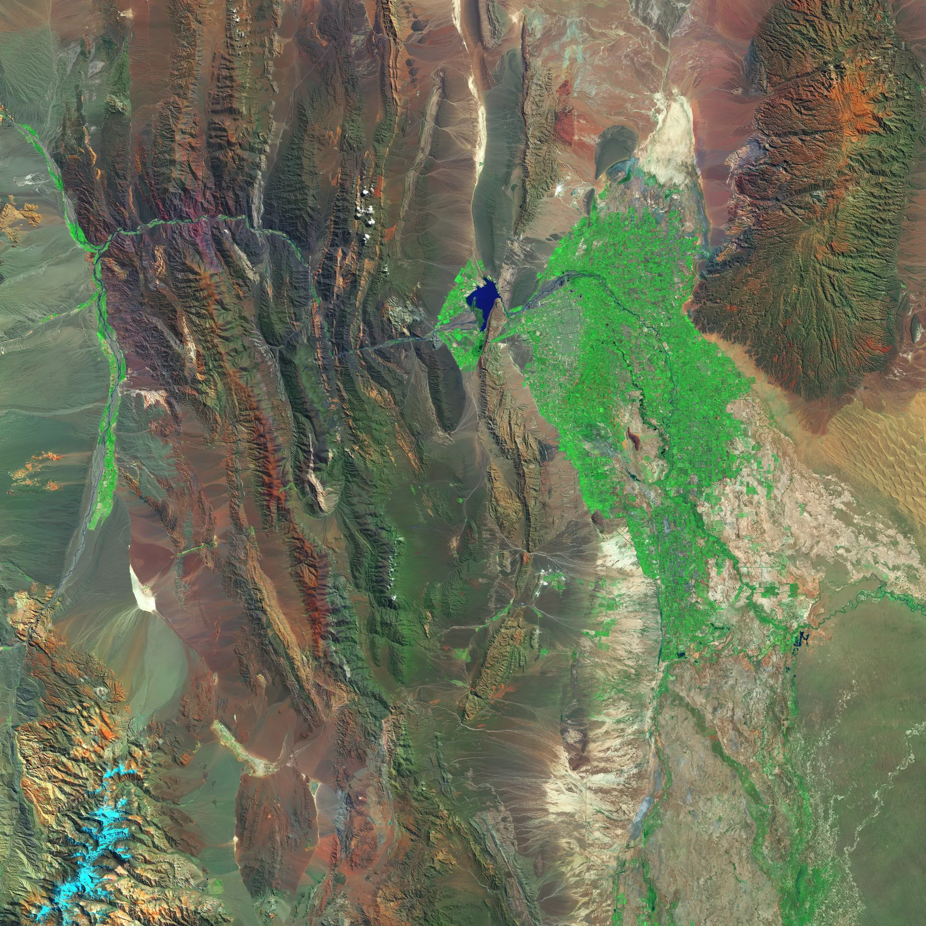 Satellite imagery of San Juan's irrigated oasis and surrounding arid mountains